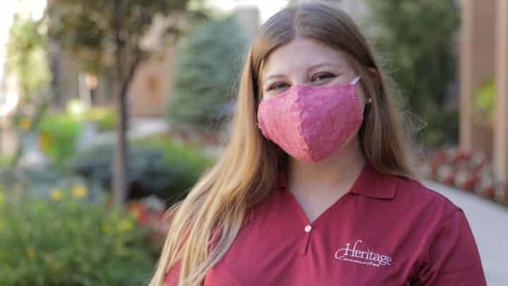 Heritage staff member wearing a protective mask