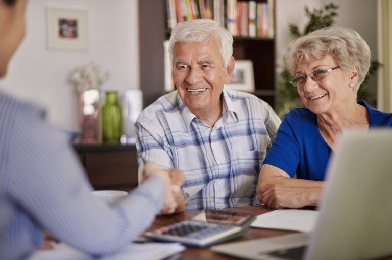 senior couple learning the questions to ask when touring senior living facilities