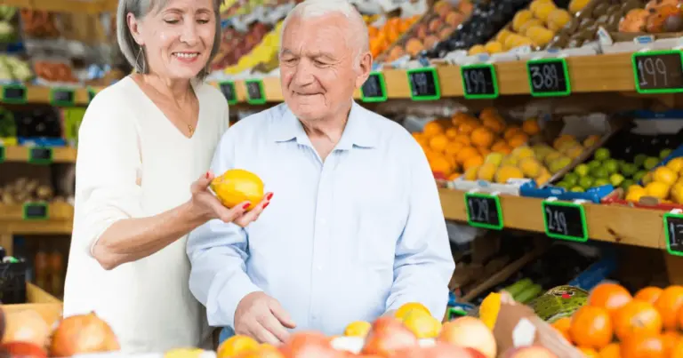 Older couple shopping at the market for dining in Phoenix West Valley