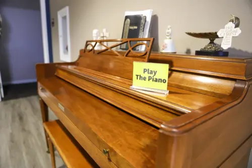 The Heritage at College View memory Care Portraits Piano station