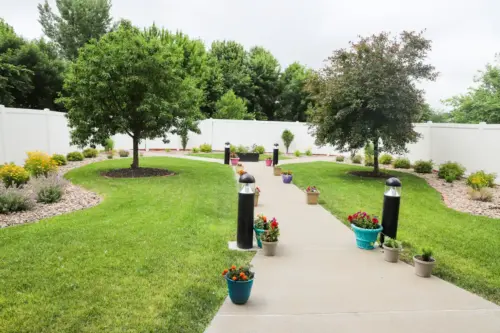 The Heritage at College View Memory care courtyard walkway