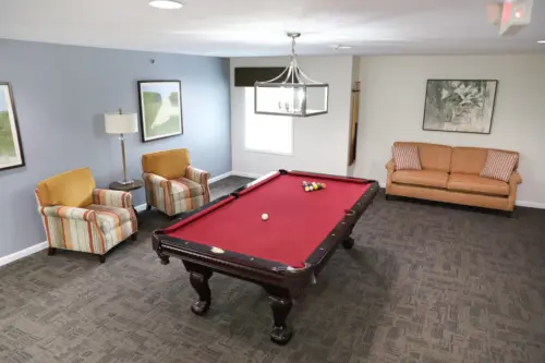 The Heritage at Fox Run assisted living billiards room