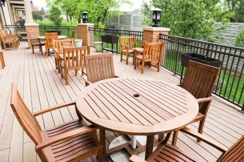 The Heritage at Legacy Wooden table and chairs in an outdoor dining area