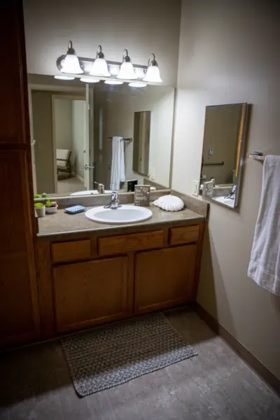 Heritage Ridge senior living apartment bathroom vanity and storage