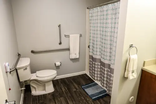 Orchard Pointe at Arrowhead apartment bath with roll-in shower