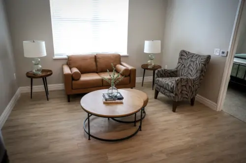 Orchard Point at Creek Valley assisted living apartment living room