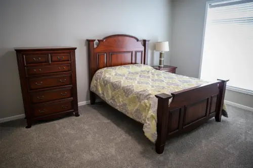 Ridgewood Senior Living independent living apartment bedroom