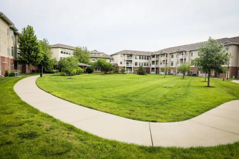 Ridgewood Senior Living community lawn and walking path