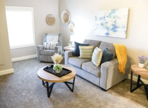 The Heritage at Sagewood assisted living apartment living room