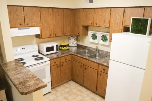 The Heritage at Northern Hills independent living apartment kitchen