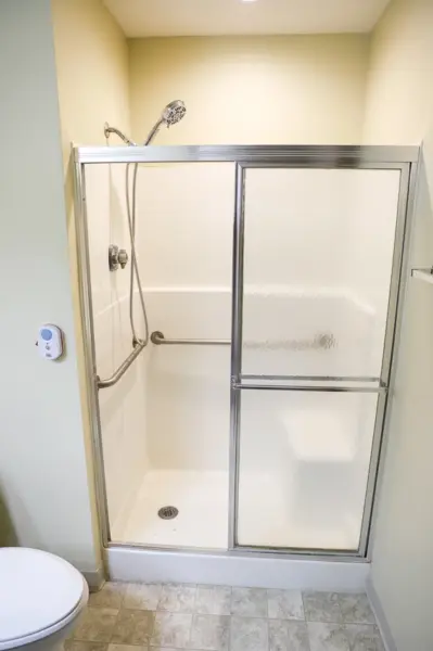 The Heritage at Northern Hills apartment walk-in shower